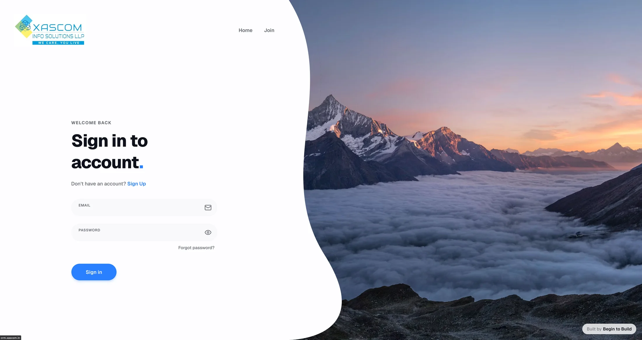 Xascom CRM sign-in screen with email and password fields beside a mountain landscape